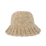 Tan woven straw bucket hat with textured knit pattern and ruffled brim.