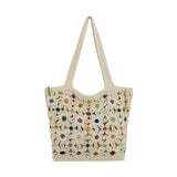 The Sak Sola Carryall Tote - Hand Crochet - Natural Multi Flowers